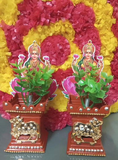 Tulsi maadam with lakshmi and cow