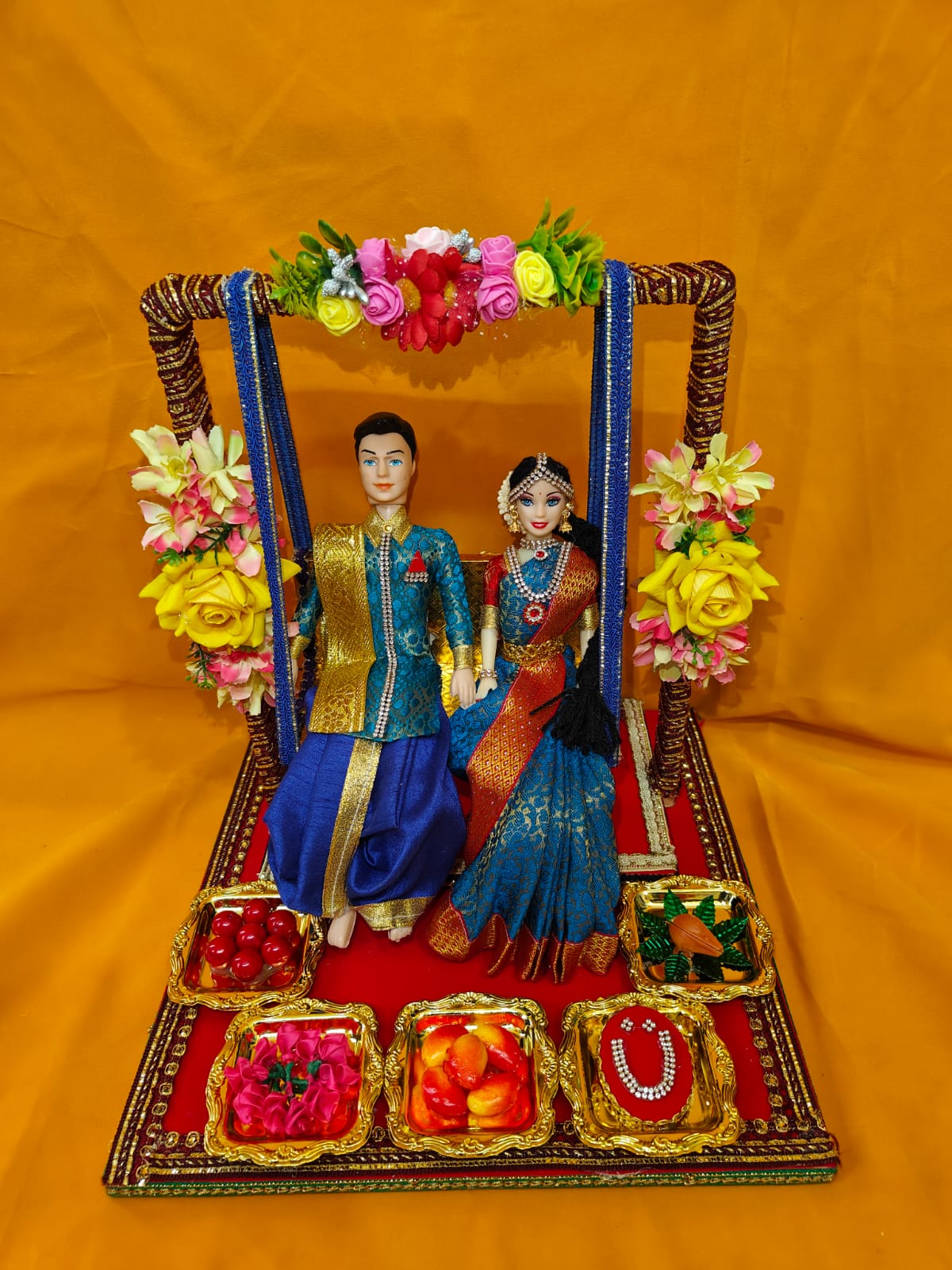 Couple dolls in Swing