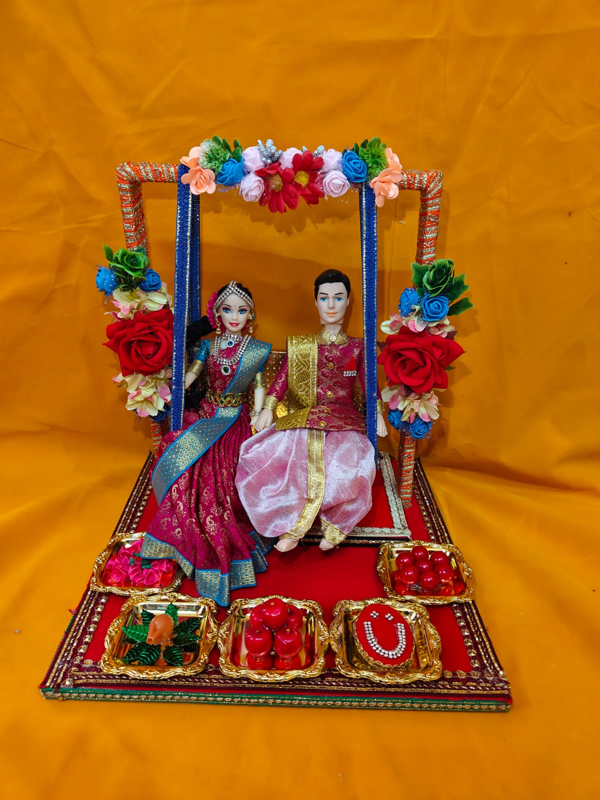 Couple dolls in Swing