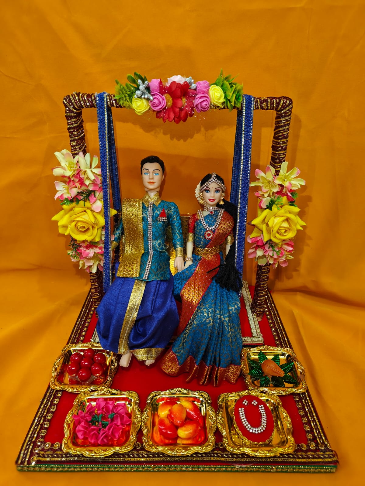 Couple dolls in Swing