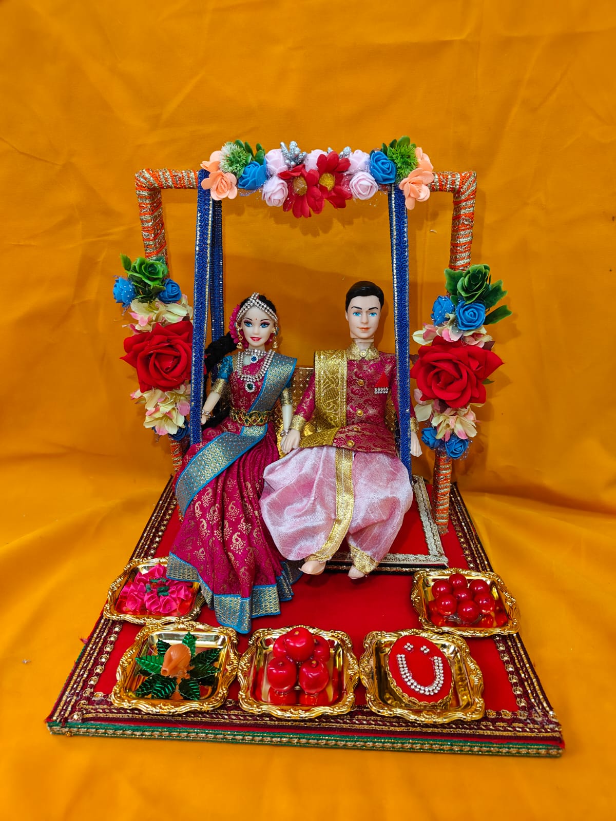 Couple dolls in Swing