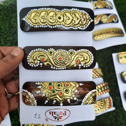 Clips with Tanjore work