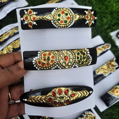 Clips with Tanjore work