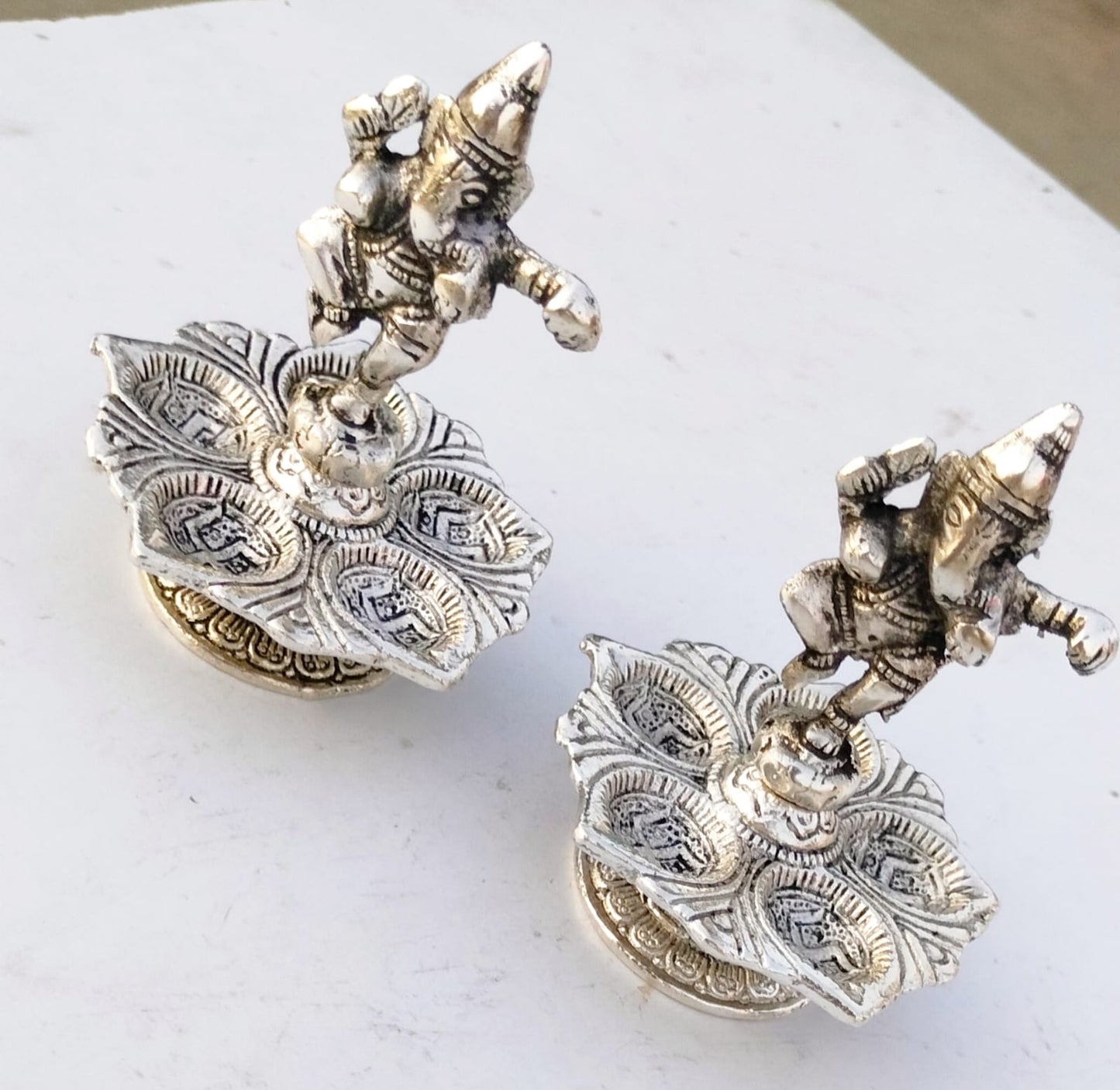 German silver antique dancing ganesh diya pair