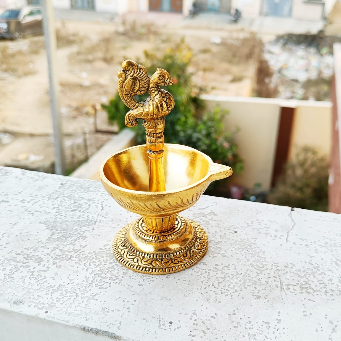 Metal statue/Diya