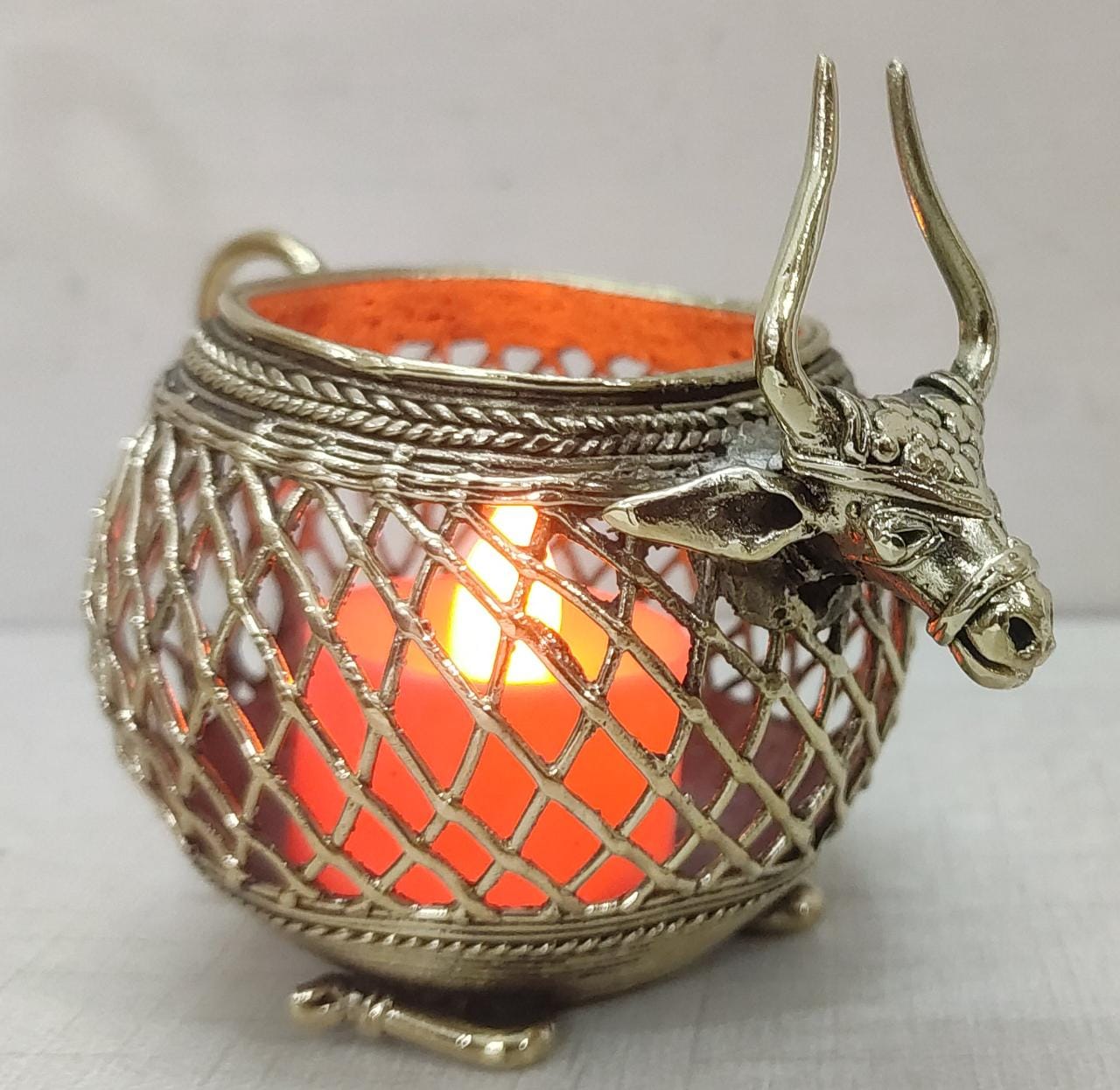 Dhokra art tea light stand